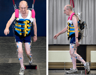 Elderly person with measuring equipment on his body on a treadmill in a laboratory