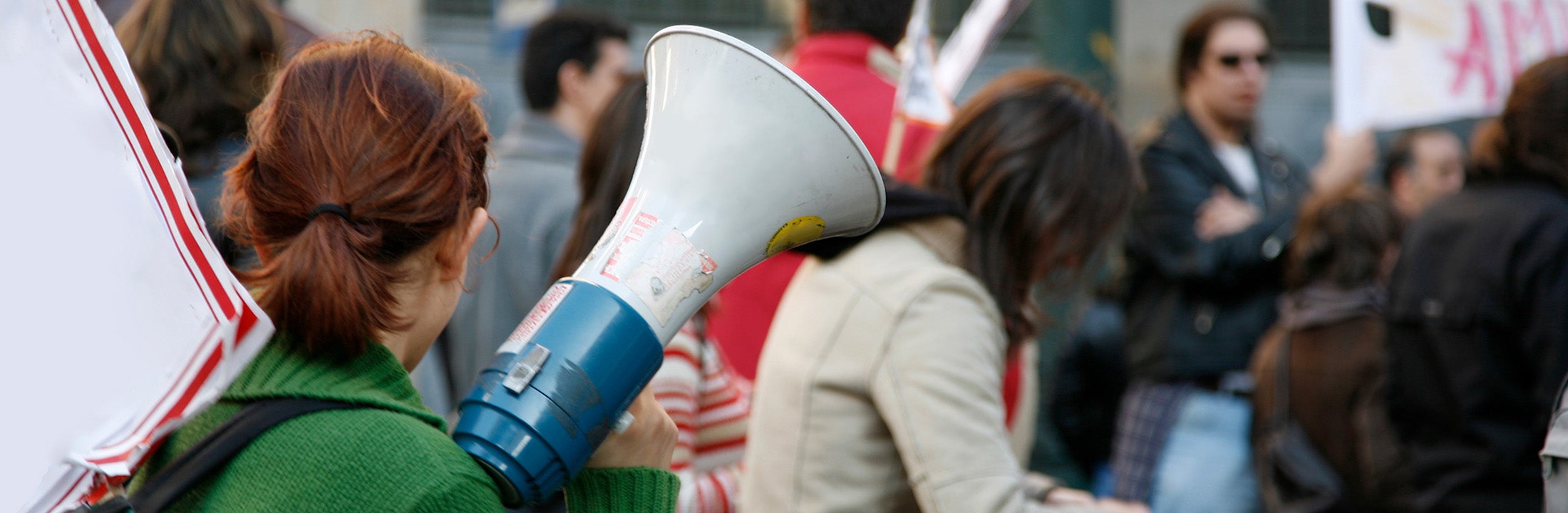  Woman with megaphone during a demonstration