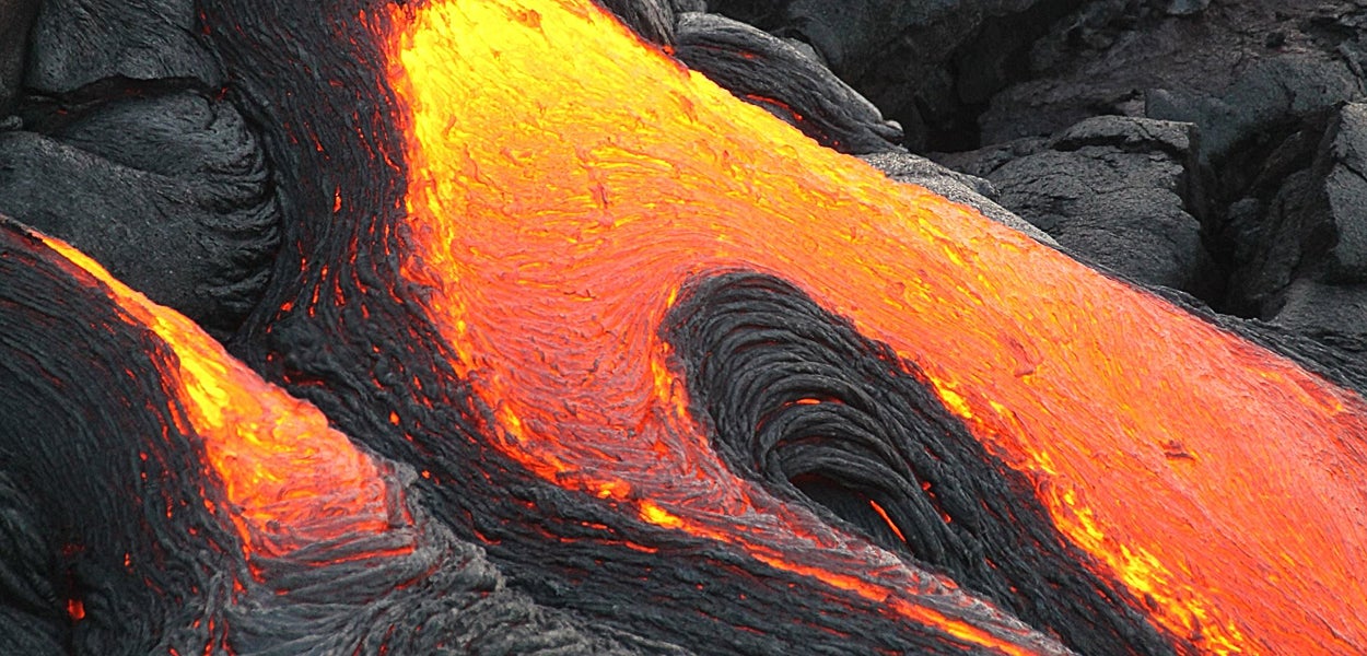Lava or magma (liquid rock) comes out of a volcano