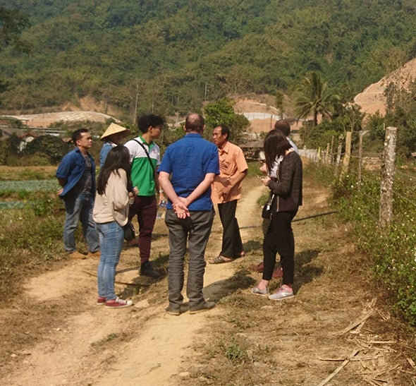 People discussing during fieldwork
